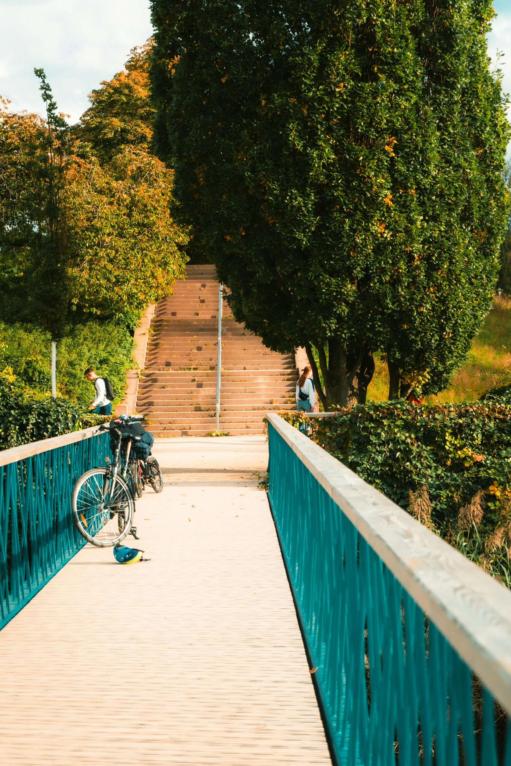 Injured bicycle delivery rider being assisted after a crash, highlighting the need for legal support in accidents involving delivery riders.